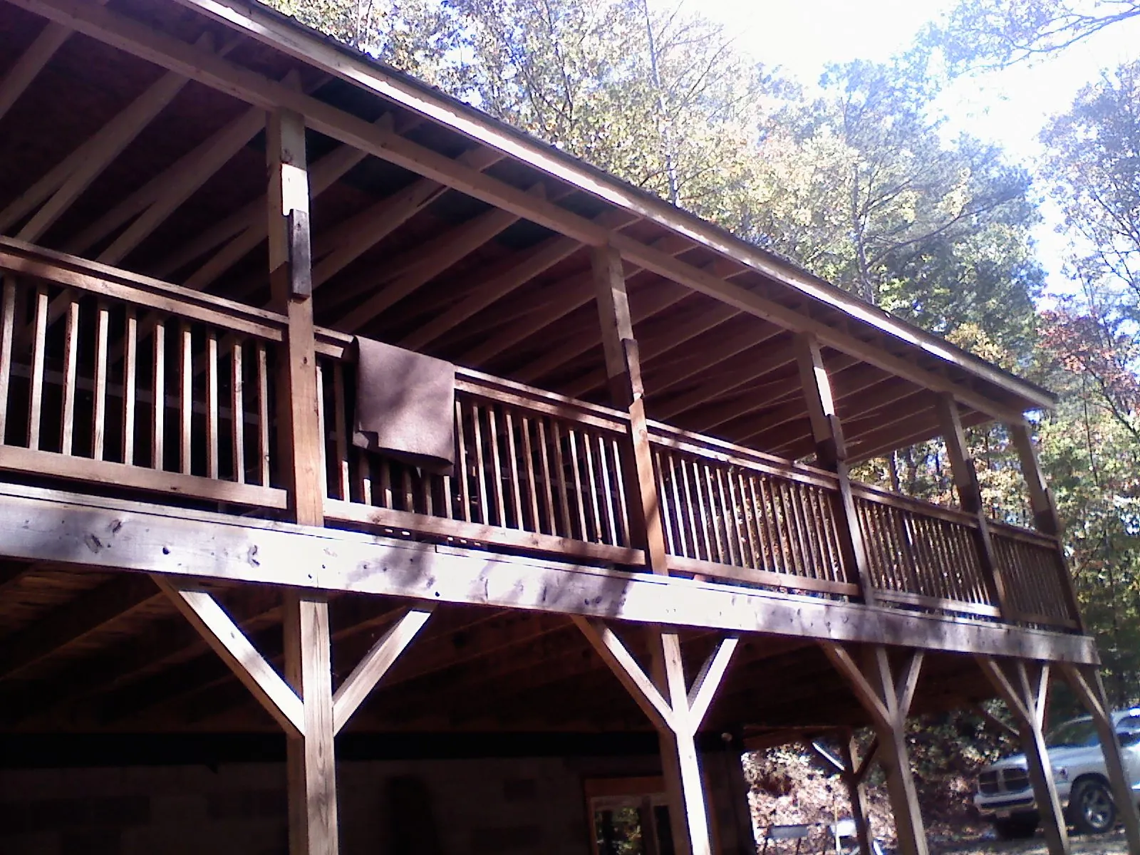 Timber framing under a new elevated porch and deck — Roof Leak Repair in Bethpage by Roofing Brothers